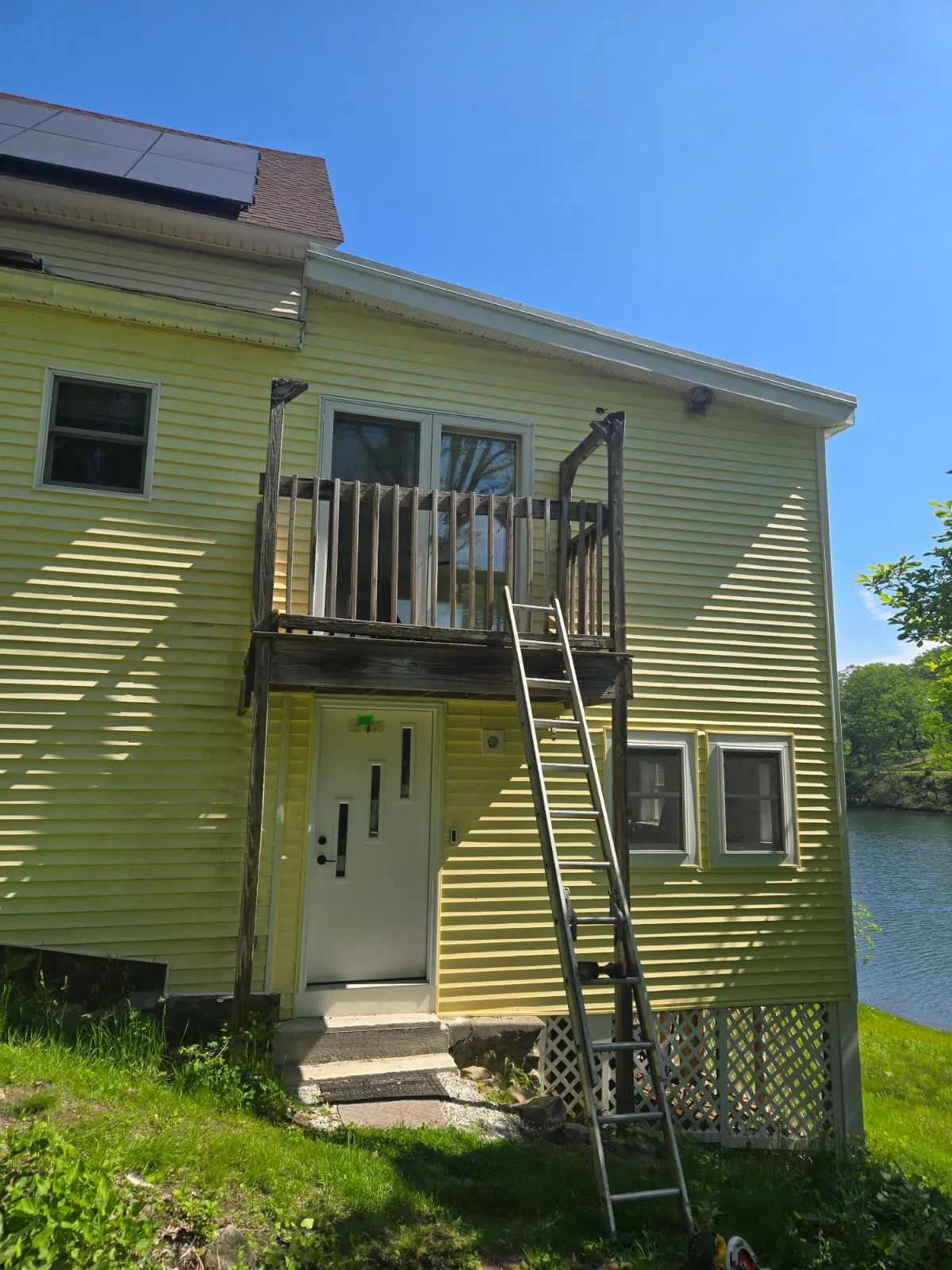 Balcony and entry rebuild by Delane Construction, before