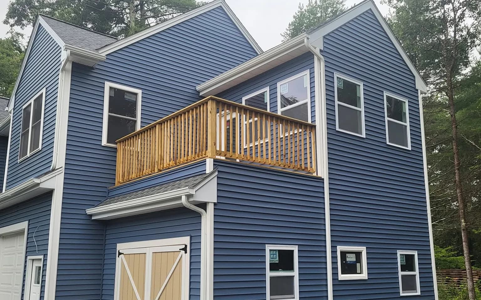 Colonial home exterior renovated by Delane Construction
